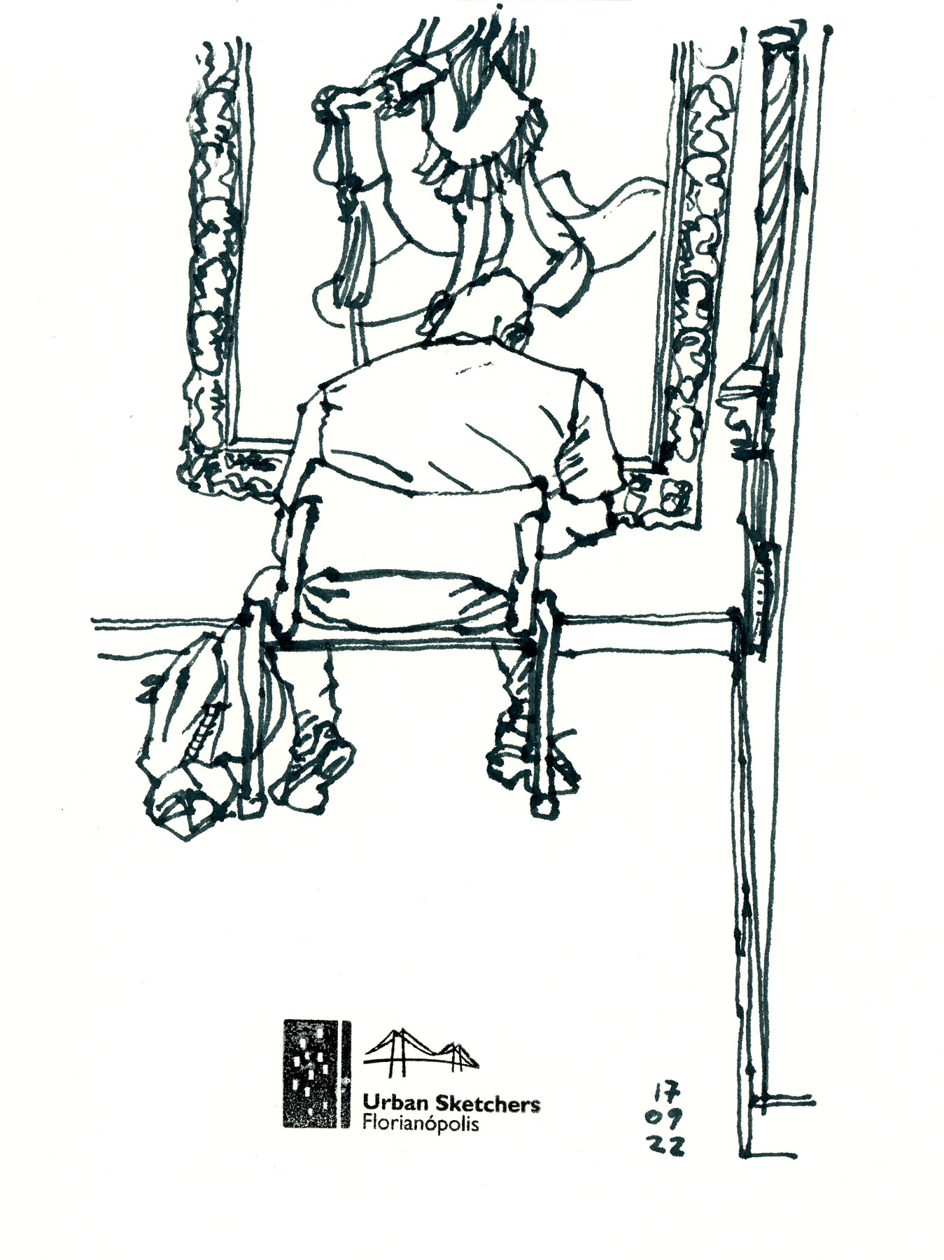 Desenho mostrando homem sentado desenhando em frente a um quadro
