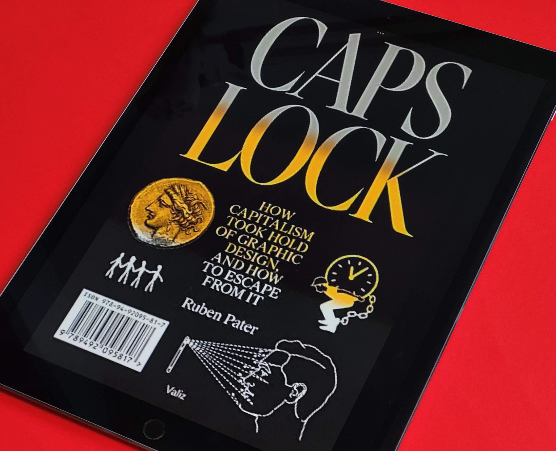 Foto do livro “Caps Lock” na tela de um tablet